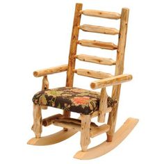 a wooden rocking chair with a floral seat pad on the front and back legs, made out of logs