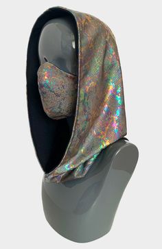 Gain protective powers from the serpent in our Medusa Ninja Hood and Mask. We've designed our reversible hoods with quality gray and rainbow holographic snake print fabric,and on the reverse side with soft fibers made from solid black sustainably harvested eucalyptus trees. Our Medusa hoods are reversible and can easily slip over your head. They are unisex one size fits all! Our Medusa masks are soft, breathable, and designed for comfort. Hidden adjustable ear straps are built in so that you can Pretty Masks Full Face, Medusa Masks, Mens Festival Outfits, Rave Hood, Spider Oc, Hood Mask, Festival Outfits Men, Rave Mask, Festival Sunglasses