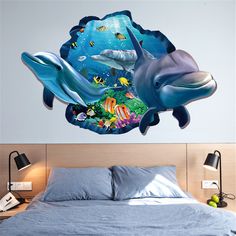 an image of a bedroom with dolphin wall decals