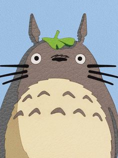 a drawing of a totoro with a green leaf on its head