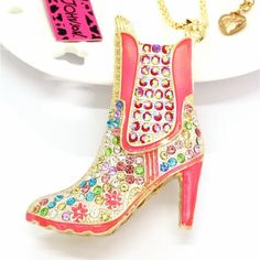 Betsey Johnson Crystal Rhinestone Cowboy Boot Dance Party Gold Pendant Charm & a 27" inch Gold Chain Necklace This Party Boot is Brought to Life Decorated with Colorful Crystals, Peachy Pink Enamel, Accented and Framed in Gold that will Draw Attention and Complements.  Displaying this Pendant is 27" inch Gold Chain with a 2" inch Extension Chain and a Lobster Clasp for a Perfect Fit & Easy Fastening. Betsey Johnson Tag and Signed Heart are Still Attached. Perfect Gift Features Pink Jeweled Rhinestone Necklace For Party, Glamorous Pink Rhinestone Necklace For Party, Pink Rhinestone Party Necklaces, Pink Rhinestone Party Necklace, Embellished Multicolor Party Necklaces, Multicolor Embellished Party Necklaces, Multicolor Embellished Party Necklace, Embellished Multicolor Necklace For Party, Rhinestone Cowboy