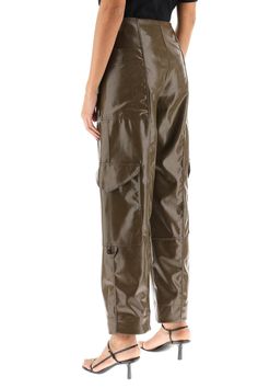 Ganni cargo-style pants made of panelled shiny faux leather with a high-rise loose fit without waistbelt. They feature large patch pockets at the hips, two cargo pockets and front closure with zip fly and snap tab. The model is 177 cm tall and wears a size EU 34. Size Info STANDARD Color Detail Brown Made In China Material 50% PL 50% PU Season One spring Season Two summer Product clothing Brand Ganni Size And Fit Leather Cargo Pants, Cargo Pants Sale, Trench Dress, Latest Fashion Design, Cargo Style, Crossbody Tote Bag, Cape Coat, Style Pants, Knitwear Cardigan