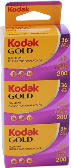 three boxes of kodak gold film sitting next to each other