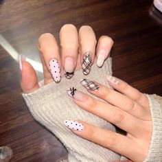 This adorable nail art design features a mix of plaid and polka dot patterns in soft pink and brown tones. Perfect for the fall season, these nails are sure to bring a smile to your face. ------ #nailart #manicure #plaidnails #polkadotnails #cutenail #cozynails #fallnails #nailinspiration #nailideas Pink And Brown Plaid Nails, Brown Plaid Nails, Plaid Nails Fall, Brown And Pink Nails, Pink And Brown Nails, Uñas Cute, Pink Nail Inspo