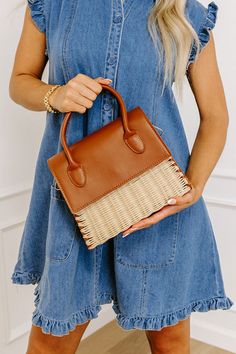 - This cutie is perfect for casual summer style! - Neutral hued woven material as well as faux leather material - Gold hardware - Button flap closure - Two handles as well as a detachable adjustable length shoulder strap - A spacious fully lined interior with a pocket Light Brown Beach Satchel For Summer, Summer Brown Woven Shoulder Bag, Light Brown Summer Satchel Shoulder Bag, Casual Light Brown Straw Bag For Spring, Light Brown Shoulder Satchel For Summer, Light Brown Summer Shoulder Satchel, Summer Light Brown Shoulder Satchel, Light Brown Satchel With Adjustable Strap For Vacation, Trendy Light Brown Straw Satchel Bag