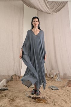 Jara Kaftan Handloomed Raw Silk Gauze This handcrafted garment is made slowly with artisan techniques. Each piece is unique. One Size Care |  Dry clean or hang in soft sunlight or breeze to freshen. Please see care label Oversized Silk Bohemian Kaftan, Silk Tunic Kurta For Summer, Bohemian Maxi Length Tunic With Relaxed Fit, Long Silk Kurta For Summer, Summer Silk V-neck Kurta, Oversized V-neck Bohemian Tunic, Bohemian Long Relaxed Fit Tunic, Summer Silk Maxi Kurta, Bohemian Style Long Relaxed Fit Tunic