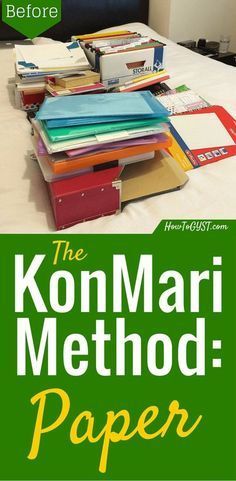 the konmari method paper book is stacked up on top of each other