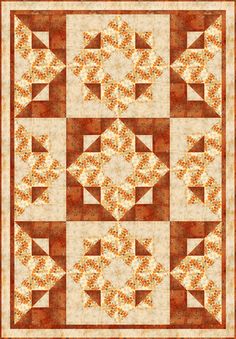 an orange and white quilt with many designs on it