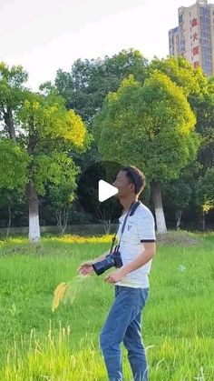 a man standing in the middle of a field