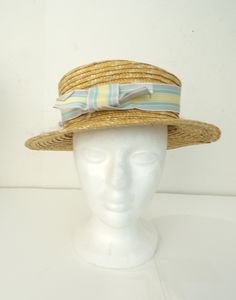 -Description- >boy's straw hat with striped bow ribbon >ribbon is blue, pink, green, yellow >cute hat! >condition: great >color(s): tan, blue, green, pink, yellow >fabric(s): straw >size: one size fits most -social media- instagram: @voguevibesvintage H#1 VVV0380 Striped Summer Cap, Striped Straw Hat With Curved Brim, Adjustable Striped Brimmed Straw Hat, Retro Spring Boater Hat With Wide Brim, Retro Spring Sun Hat Cap, Striped Brimmed Straw Hat, Adjustable Brimmed Retro Boater Hat, Retro Adjustable Brimmed Boater Hat, Vintage Adjustable Cap Straw Hat