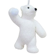 a white teddy bear ornament hanging from a string