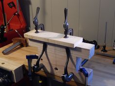 the workbench is being worked on with tools