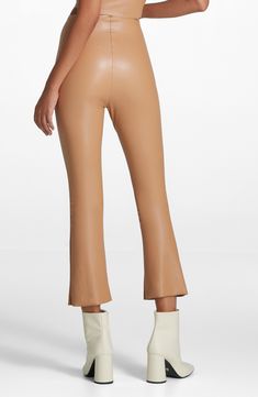 These faux-leather pants come with a serious dose of attitude and a tummy-smoothing panel that only you need to know about. The fit will feel snug at first then stretch to your shape within first wear. 25" inseam; 16" leg opening; 12" front rise; 15" back rise (size Medium) Pull-on style Elastic-free internal smoothing waistband 55% polyurethane, 44% viscose, 1% elastane Machine wash, line dry Made in the USA of imported fabric Stretch Leather Wide Leg Pants, Stretch Brown Leather Pants For Work, Brown Stretch Leather Pants For Work, Sleek Stretch Brown Bottoms, Chic Beige Leather Bottoms, Elegant Beige Leather Bottoms, Brown Stretch Leather Pants, Sleek Brown Stretch Bottoms, Sleek Brown Leather Bottoms