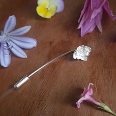 Flower Stick Pin - Blossom Brooch This pin or brooch is handmade in sterling silver. Flower - 12mm diameter. Stem - 55 to 60mm long. With a sterling silver pin protector. Part of a collection inspired by the Cherry Blossom flower. The delicately layered petals give this stick pin a pretty and elegant style.  Gift boxed with a tiny polishing cloth inside and tied with ribbon - ready to give as a present! For more of my Flowers & Plant jewellery: https://www.etsy.com/uk/shop/RockRoseJewellery?sect Cherry Blossom Flower, Plant Jewelry, Floral Pins, Cherry Blossom Flowers, Wedding Bridal Jewellery, Silver Pin, Stick Pins, Delicate Details, Blossom Flower