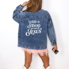 You will love this Christian denim jacket for women. It features the phrase, "What a Friend We Have in Jesus," on the back. Share your faith in Jesus with others through your apparel.  🔹 Key Features 🔹 Lapel Collar: The lapel collar gives the jacket a classic look. Button-Front Closure: Metal button closure for a timeless style. Long Sleeves with Buttoned Cuffs: Perfect for a comfortable and relaxed fit. Front Pockets: Large slanted pockets at the front for convenience. Chest Pockets: Button-f Christian Denim Jacket, Casual Denim Jacket With Letter Print For Winter, Casual Winter Denim Jacket With Letter Print, Winter Casual Denim Jacket With Letter Print, Casual Denim Outerwear With Letter Print, Denim Jacket With Letter Print For Fall, Fall Denim Jacket With Letter Print, Long Sleeve Denim Jacket With Letter Print For Fall, Fall Long Sleeve Denim Jacket With Letter Print