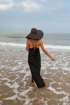 Dress to impress in our black Adriana maxi dress! This flowy dress features an open back with a drawstring to tie and slits at the bottom for an extra flair. Though unlined, the dress is not sheer. Sizes: S-M / M-L S-M: Length 50.39 in - Width 15.35 in M-L: Length 51.18 in - Width 16.14 in 70% cotton - 30% linen Washing: handwash Summer Beach Backless Dress With Lace-up Back, Black Backless Maxi Dress With Tie Back, Spring Black Backless Dress With Lace-up Back, Spring Maxi Dress With Lace-up Back, Elegant Beach Backless Dress With Lace-up Back, Elegant Backless Dress With Lace-up Back For Beach, Elegant Lace-up Backless Dress For Beach, Chic Backless Maxi Dress For Vacation, Chic Backless Maxi Dress For Beach Season