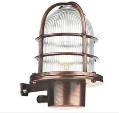 an old fashioned light fixture on a white background