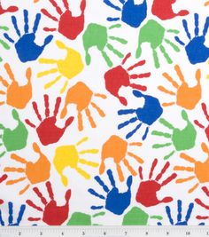 colorful handprints on white fabric with blue, green, orange and yellow colors