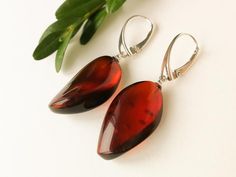 Small dark red amber earrings with silver sparkly burgundy | Etsy Handmade Elegant Baltic Amber Earrings, Elegant Handmade Baltic Amber Earrings, Elegant Baltic Amber Dangle Jewelry, Baltic Amber Earrings As A Gift, Modern Amber Earrings As A Gift, Modern Amber Earrings For Gift, Golden Logo, Christmas Gifts For Wife, Amber Earrings