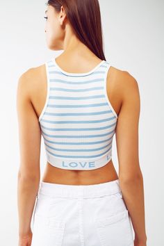 Introducing our Striped Cropped Top with Love Text in Blue, a trendy and stylish addition to your summer wardrobe. This top combines a cropped length, a playful stripe design, and a touch of love to create a chic and eye-catching look. Designed in a cropped length, this top sits perfectly at the waistline, allowing you to show off your favorite high-waisted bottoms or create a flirty and fashionable ensemble. The stripe design adds a touch of classic style, while the contrast collar adds a subtl Love Text, Contrast Collar, Top Cropped, Comfortable Tops, Comfy Fashion, Running Tops, Sleeveless Crop Top, Striped Tank Top, Fine Knit