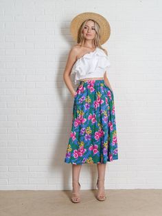 Vintage 80s Blue Wrap Skirt - Floral Hawaiian Print -Measurements-Estimated Size: Small/Medium Bust: ---Waist : 26-29"Hips: freeLength: 31"Sleeve: ---Model is 5'9 and measures 32/25/34 Retro Floral Print Summer Skirt, Retro Floral Print Skirt For Summer, Blue Summer Skirt For Garden Party, Blue Skirt For Summer Garden Party, Retro Blue Floral Print Skirt, Blue Retro Skirt With Floral Print, Spring Vacation Retro Skirt, Retro Spring Vacation Skirt, Retro Skirt For Spring Vacation