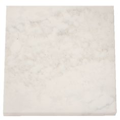 a white marble tile that looks like it is being used as a wallpaper or floor covering