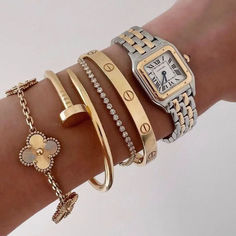 The exquisite design of this gold nail clover bracelet set makes it a standout piece in any jewelry collection. A perfect blend of luxury and style. Elegant Stackable Jewelry For Everyday Elegance, Luxury Stackable Gold Bracelet For Everyday, Luxury Everyday Stackable Gold Bracelet, Silver Luxury Everyday Bangle, Elegant Polished Bangle For Everyday Luxury, Elegant Bangle With Polished Finish For Everyday Luxury, Luxury White Gold Stackable Gold Bracelet, Everyday Elegance Jubilee Bracelet, Timeless Polished Finish Cuff Bracelet