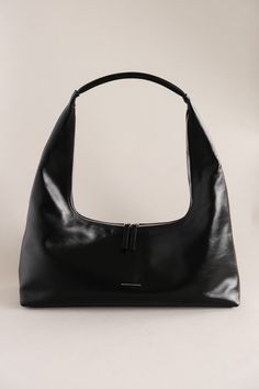 MARGESHERWOOD Large hobo bag in glossy black leather. H4.25" x W10" x D2.5". Total height 12". MW241-BG22-BKGP PIPE AND ROW Sleek Black Glossy Shoulder Bag, Classic Black Bag With Glossy Finish, Classic Black Bags With Glossy Finish, Black Leather Shoulder Bag With Glossy Finish, Black Glossy Business Bag, Glossy Leather Tote Bag, Modern Black Hobo Bag With Smooth Grain, Modern Bags With Glossy Finish For Everyday Use, Modern Everyday Bag With Glossy Finish