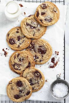 chocolate chip cookies on a cooling rack with powdered sugar