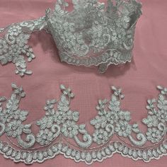 Make your special occasion even more remarkable and timeless with our Floral Lace Trimming Embroidered on 100% Polyester Net Mesh. Perfect for wedding dresses, evening gowns, dance costumes, and more, this exquisite product is handmade and of the highest quality. Made of 100% Polyester and measuring 4" wide, this Floral Lace Trim is an elegant and luxurious addition to any outfit. Our factory offers four enchanting colors to choose from, so you're sure to find one that catches your eye. Give your look a luxurious addition and get the most out of your special occasion. Our corded lace trim, lace trim, couture lace trim, Corded couture lace trim, Corded bridal lace trim, bridal lace trim, Corded evening dress lace trim, evening dress trim Corded, quinceanera dress trim, Corded trim for quinc Elegant Embroidered Organza Lace, Elegant Silver Floral Embroidered Fabric, Elegant Embroidered Organza Wedding Dress, Elegant Embroidered Lace For Mother Of The Bride, Elegant Silver Embroidered Organza Fabric, Elegant Floral Embroidered Wedding Lace, Elegant Silver Embroidered Fabric For Wedding, Elegant Lace Embroidered Fabric For Wedding, Elegant Wedding Embroidered Fabric With Lace Trim