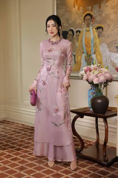 Phyllis Round Neck Ao Dai | MEAN BLVD Feminine Floral Print Festive Dresses, Festive Feminine Floral Print Dresses, Feminine Festive Silk Dresses, Festive Feminine Silk Dress, Traditional Floral Embellished Festive Dress, Elegant Pink Ao Dai With Floral Embroidery, Traditional Pink Floral Dress, Elegant Floral Embellished Festive Dresses, Elegant Long Sleeve Embroidered Floral Dress