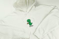 Hoodie is 50% Cotton/ 50% Polyester. Design is Embroidered. Tea Rex, Remove Oil Stains, Hoodie Aesthetic, Embroidery Hoodie, Aesthetic Hoodie, Funny Hoodies, Pull Sweat, Oil Stains, Embroidered Hoodie