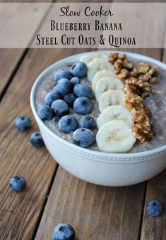 blueberry banana steel cut oats and quinoa in a bowl on a wooden table