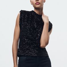 Zara Woman Collection Sleeveless Round Neck Top With Shoulder Pads. Tonal Sequin Appliqu. Chic Sleeveless Sequin Blouse, Chic Sequined Sleeveless Blouse, Chic Tank Top For Fall Night Out, Chic Stretch Vest For Party, Sleeveless Evening Tops For Fall, Black Sequin Tank Top For Evening, Sleeveless Tops For Night Out In Fall, Sleeveless Tank Top For Fall Party, Black Sleeveless Glamorous Top