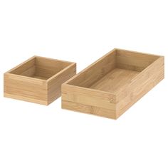 two wooden boxes sitting next to each other