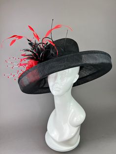 Black Hat base adorned with red center decor, curled ostrich spines and cut feathers. Fits crown size of 22.5" with internal elastic band to create a snug and comfortable fit for crown sizes smaller than 22.5". Please measure prior to purchasing as all sales are final. Don't forget to follow us on Instagram! Black High Crown Top Hat For Races, Black High Crown Hat For Races, Black Costume Hat With Curved Brim For Races, Adjustable Red Hat Bands For Kentucky Derby, Black High Crown Top Hat For Spring, Black High Crown Fascinator For Kentucky Derby, Black High Crown Fascinator With Adjustable Fit, Black High Crown Hat For Royal Ascot, Black High Crown Top Hat