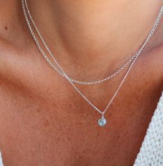 Reminiscent of crystal clear waters this blue CZ stone echoes the March birthstone - aquamarine. Our beautiful drops necklace is crafted for not just for March babes or those with March babes but as a symbol of youth, health and hope. Drops Necklace, Rectangle Necklace, Tiny Pendant, Hope Necklace, Oval Necklace, Symbol Necklace, March Birthstone, Zodiac Necklaces, Crystal Clear Water