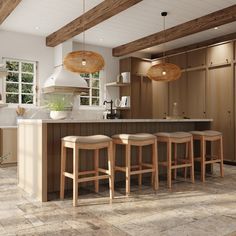 a large kitchen with wooden cabinets and stools