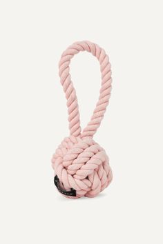 a pink rope with a black tag on it