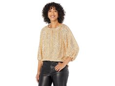 Vince Camuto Raglan Sleeve Top with Keyhole - Women's Clothing : Gold : Add some shine to your ensemble wearing the chic Vince Camuto Raglan Sleeve Top with Keyhole that features sequin work. Pullover style. Round neckline with cut-out detailing. Three-quarter length puffed sleeves with elasticized cuffs. Allover sequin detailing. Straight hemline. 100% polyester. Machine washable. Imported. Measurements: Length: 25 in Product measurements were taken using size SM. Please note that measurements Glamorous Party Top With Blouson Sleeves, Fall Evening Tops With Blouson Sleeves, Glamorous Evening Tops With Blouson Sleeves, Glamorous Puff Sleeve Tops For Spring, Glamorous Fall Blouse With Blouson Sleeves, Glamorous Long Sleeve Tops With Blouson Sleeves, Glamorous Blouse With Blouson Sleeves For Fall, Glamorous Spring Blouse With Blouson Sleeves, Blouson Sleeve Tops For Night Out