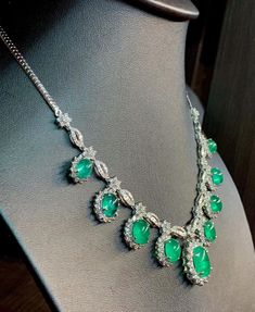 "\"The Cabochon Emerald Necklace\" - Worldclass masterpiece! THIS SET IS A MUST HAVE FOR ANY JEWELRY COLLECTOR! HUGE AND SPARKLING! Vivid green emeralds with full gemological certificates! Surrounded by almost 9 carats of natural DIAMONDS! Glamorous! Set in one of a kind, elegant 18K solid white gold, handmade settings! THIS LISTING INCLUDES BOTH THE NECKLACE AND THE EARRINGS! Suggested Retail price: $45,000 USD NECKLACE & PENDANT: Central emerald: 5.55 carats! Vivid green, with great transl Emerald Jewellery, Earrings Chain, Diamond Necklace Designs, Vs Diamond, Emerald Necklace, White Gold Earrings, Emerald Jewelry, Chain Pendant, High Jewelry