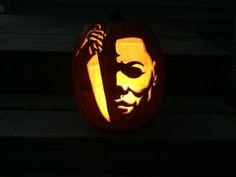 a pumpkin carved to look like abraham lincoln