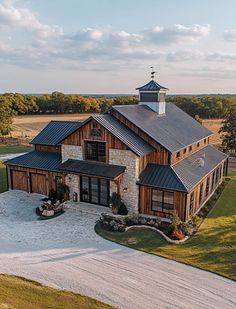 an aerial view of a large house in the country