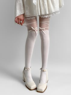 Get the perfect mix of elegance and playfulness with our fake two-piece tights featuring adorable bowknot details. Available in classic black or white, these tights are a versatile addition to your wardrobe.   Please note that this product includes only one pair of tights. Thigh High Party Hosiery With Bow, Thigh High Bow Legwear For Party, Thigh-high Bow Legwear For Party, Elegant White Thigh-high Stockings, Elegant White Thigh High Stockings, Fitted Bow Stockings For Party, Elegant Tight White Tights, Elegant White Stretch Legwear, White Thigh High Party Hosiery