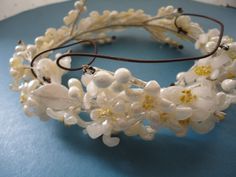 "Very rare and highly sought after Art Deco wedding tiara/crown/headdress/circlet Made from wax orange blossom flowers, buds and leaves with longer sprays that are finished with a sparking diamante. Arranged on satin covered wire it currently has a piece of elastic to help keep it on your head, however this could easily be removed if desired. Measures approx 5\" (13.5cm) in diameter. It would look stunning just worn as a crown/circlet or incorporated into an \"up do\". The tiara is in excellent Wedding Gatsby, Crown Headdress, Bridal Headdress, Gatsby Wedding, Tiara Crown, Art Deco Wedding, Wedding Tiara, Wedding Deco, Tiaras And Crowns