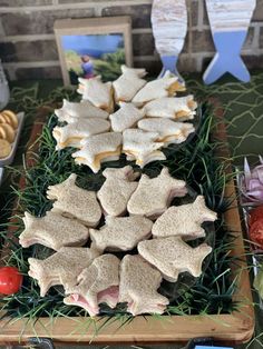 a platter filled with sandwiches and other snacks