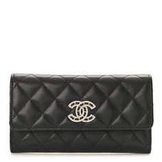 This is an authentic CHANEL Caviar Quilted Crystal CC Large Gusset Flap Wallet in Black. This chic clutch wallet is crafted of diamond quilted luxurious caviar leather in black. The wallet features a front flap with a gold chain and crystal encrusted Chanel CC logo. This opens with a snap to a partitioned black leather and fabric interior with a card slot panel, patch pockets, and a coin pocket. Chanel Caviar, Chanel Wallet, Diamond Quilt, Cc Logo, Clutch Wallet, Card Sizes, Gold Chain, Patch Pocket, Gold Chains