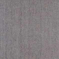 a black and white herringbone pattern on the back of a suiting material fabric