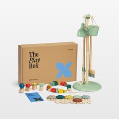 the play box is filled with wooden toys and other things to make it fun for children