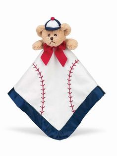 a teddy bear is wearing a baseball uniform